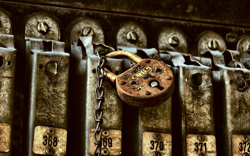 Rusty padlock on lockers