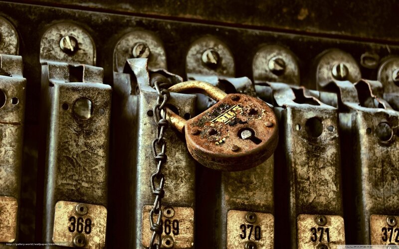 Rusty padlock on lockers