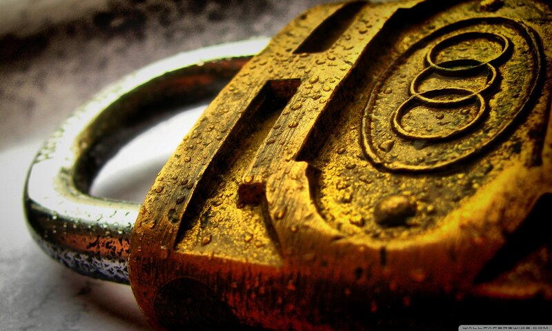 Rusty Padlock with Water Droplets