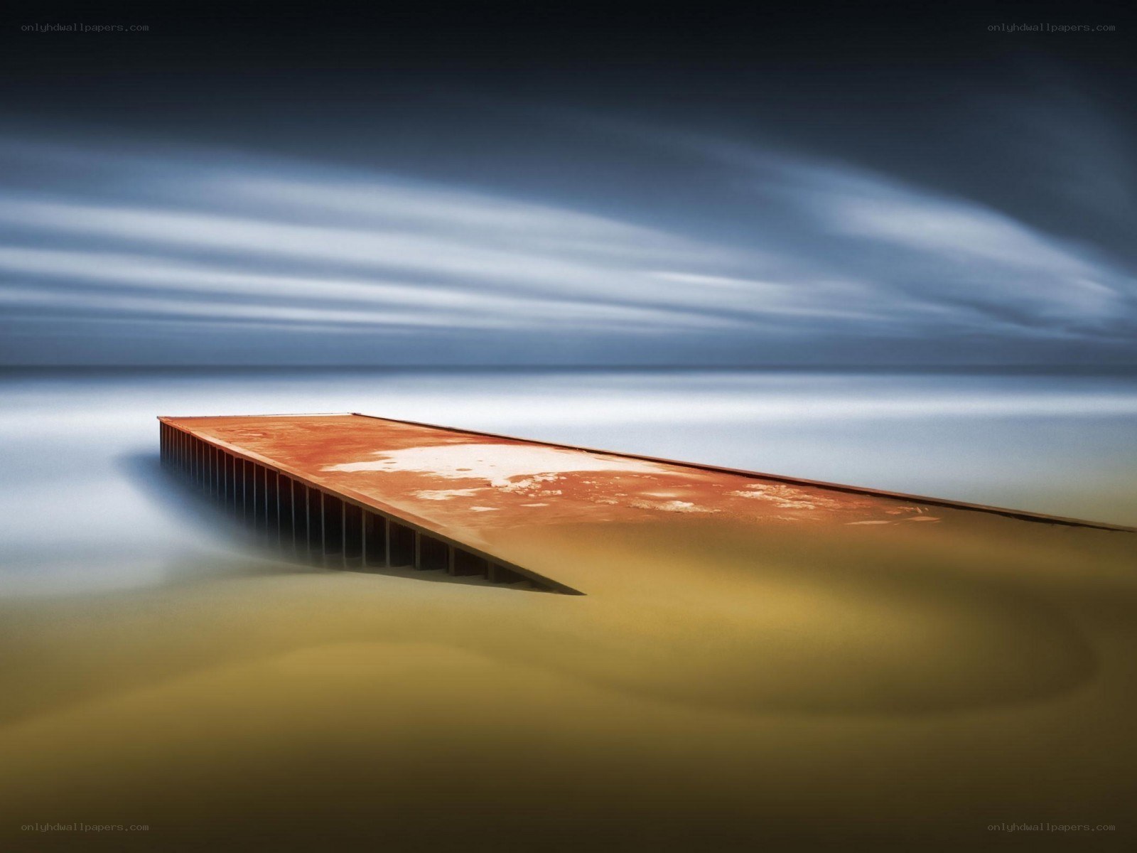 Rusty pier at sea