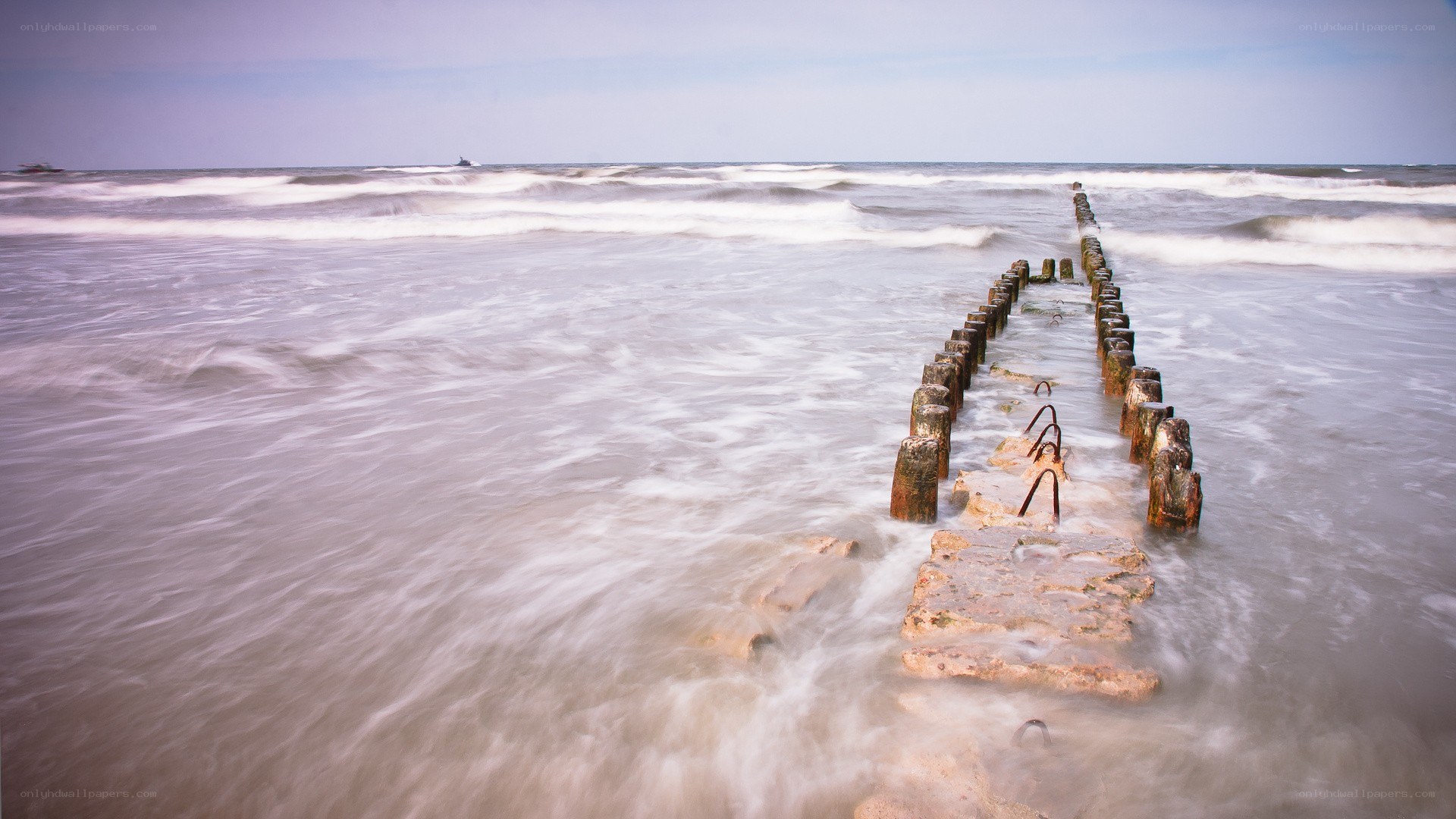 Rusty pier in the ocean