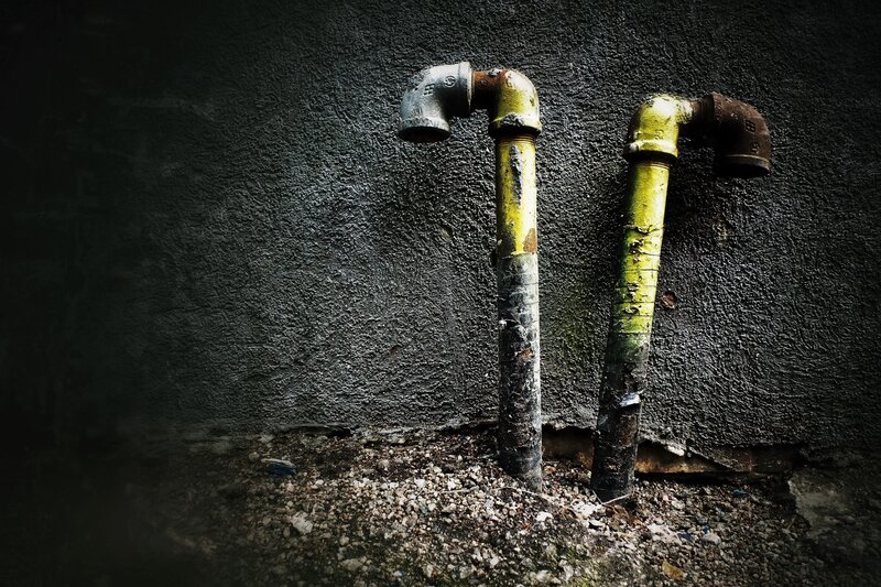 Rusty Pipes on Wall