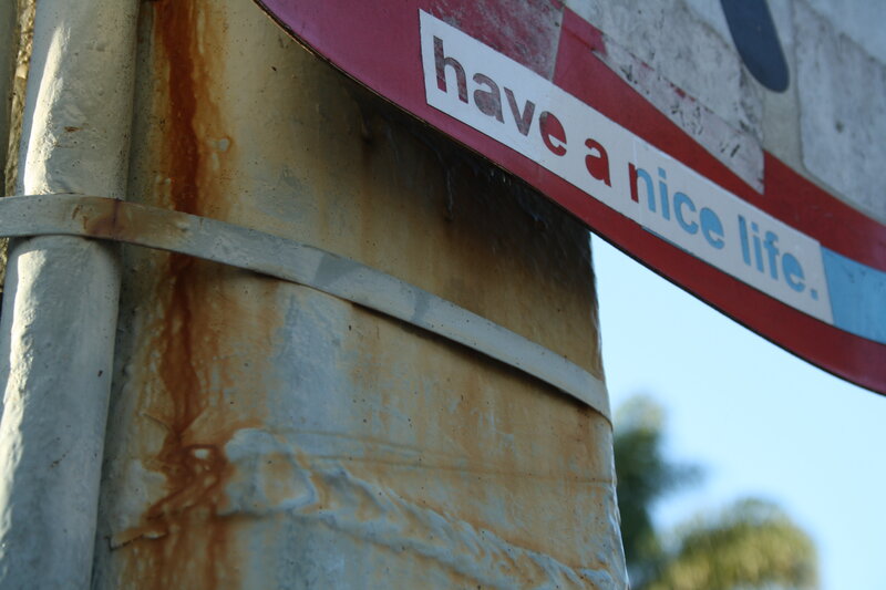 Rusty Pole with Sign