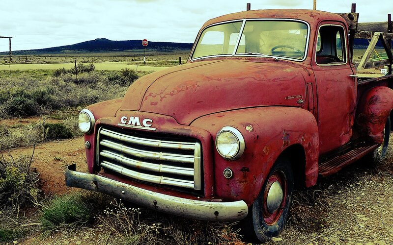 Rusty Red GMC Truck — Dusty