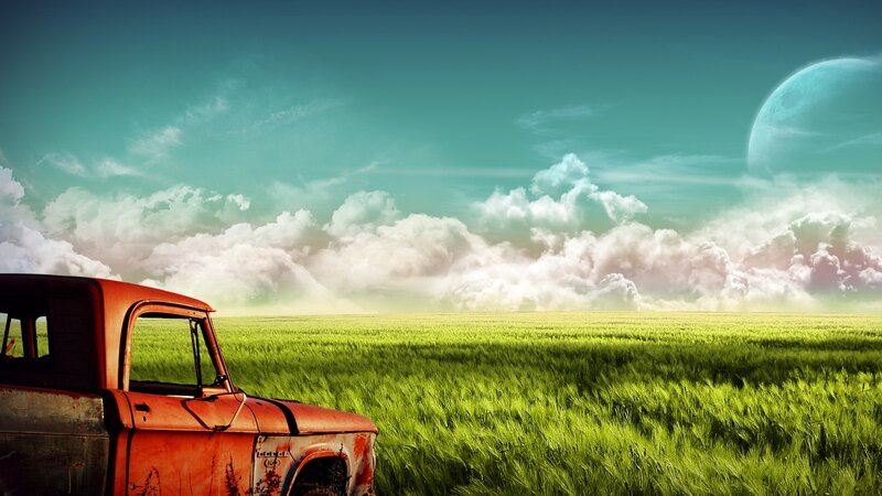Rusty Red Truck in Field