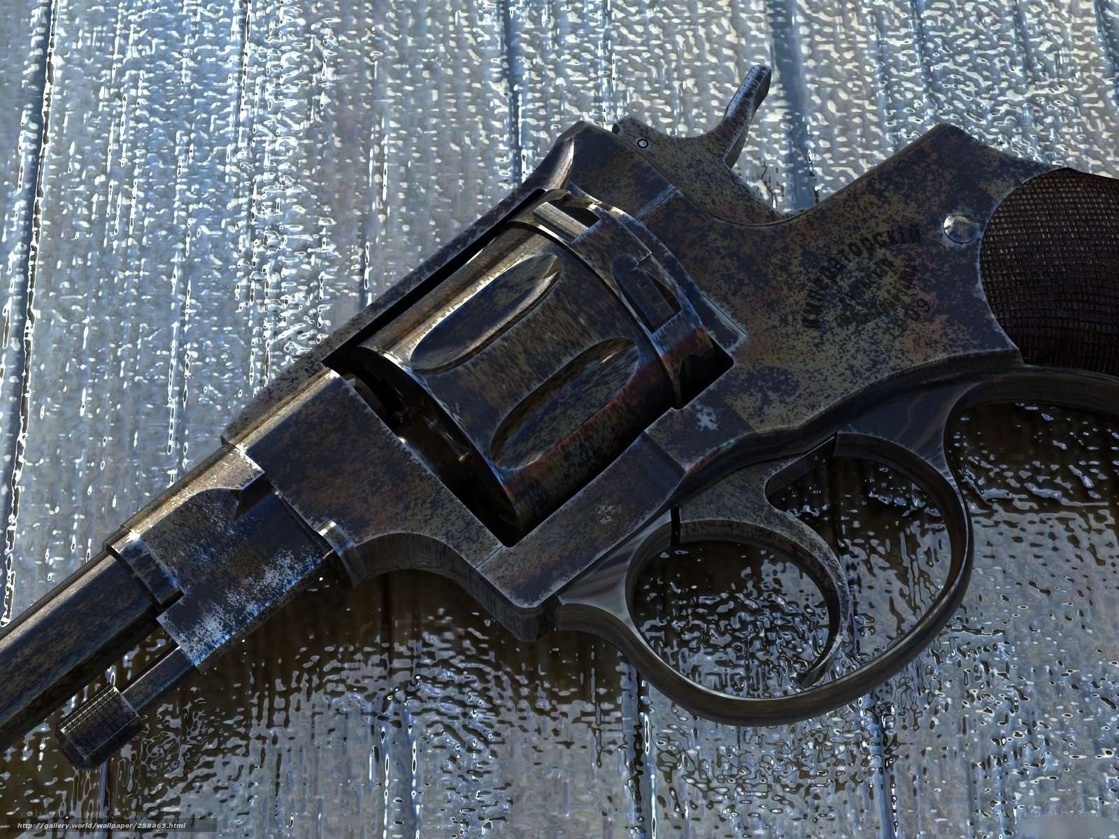 rusty revolver on wet surface