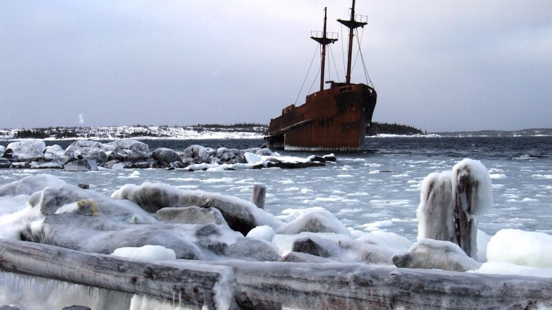 Rusty Shipwreck in Ice