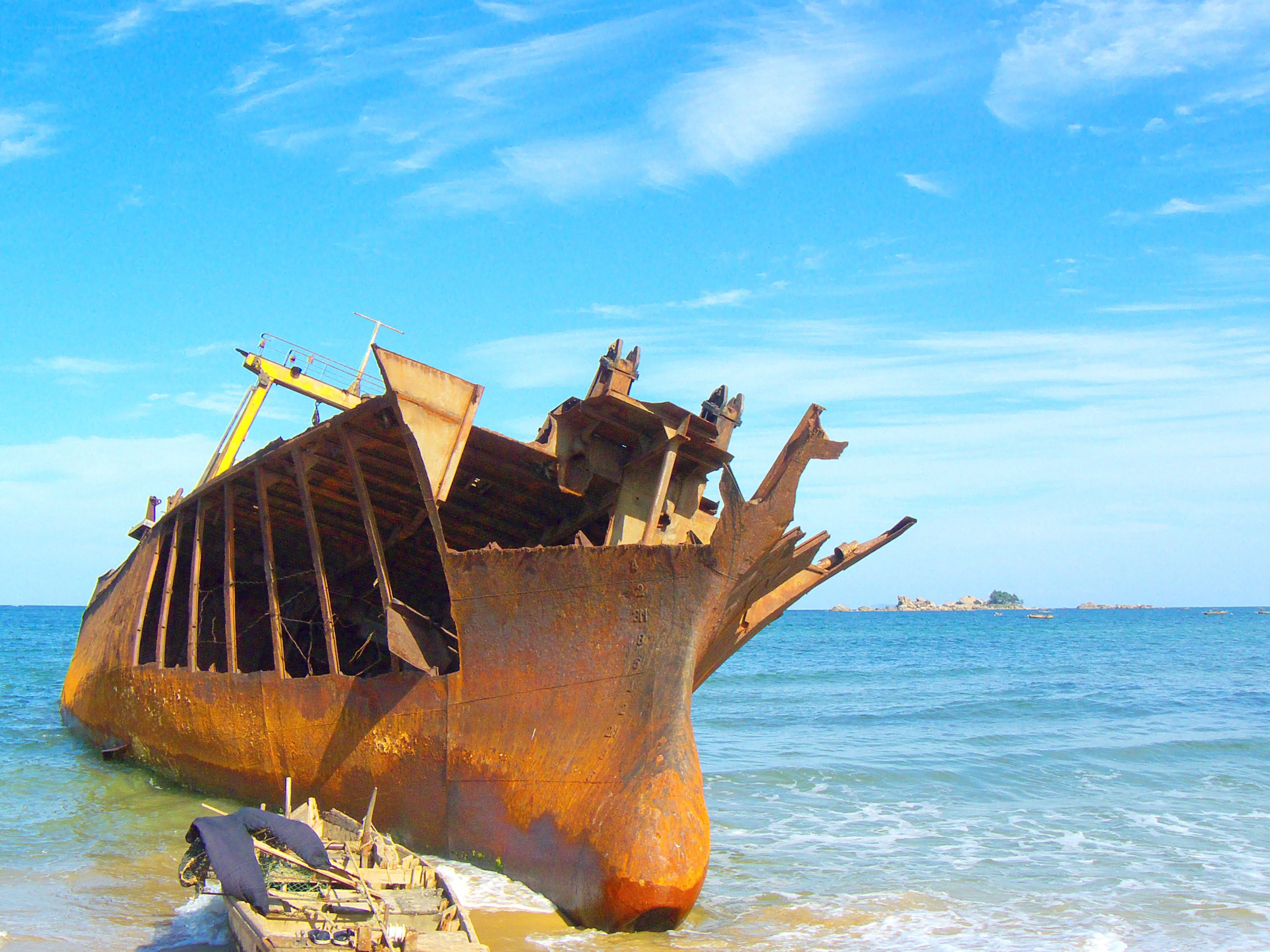 Rusty shipwreck on a beach