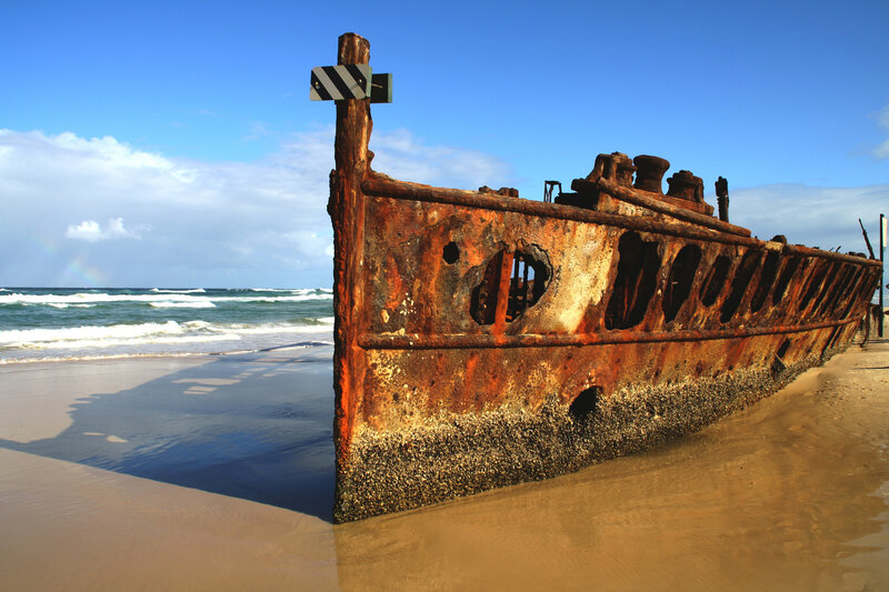 Rusty shipwreck on a beach