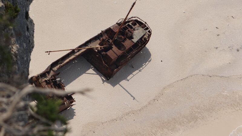 Rusty Shipwreck on Beach — Brown