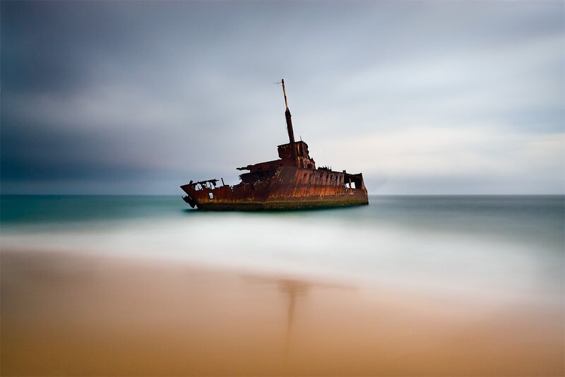 Rusty shipwreck on the shore