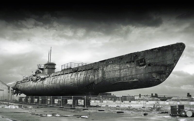 Rusty Submarine on Land — Black, Dramatic, Photograph