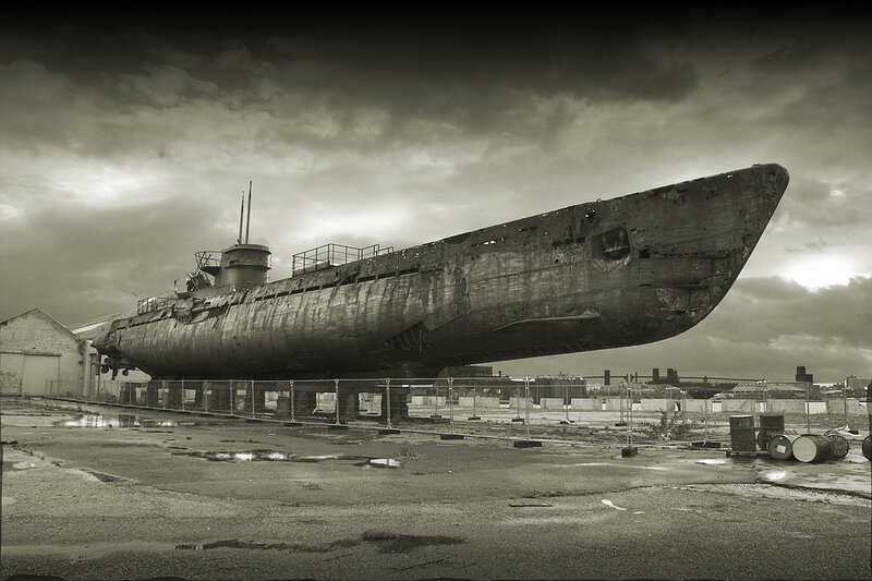 Rusty Submarine on Land — Gray, Dramatic, Photograph