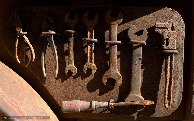 Rusty tools on a wall