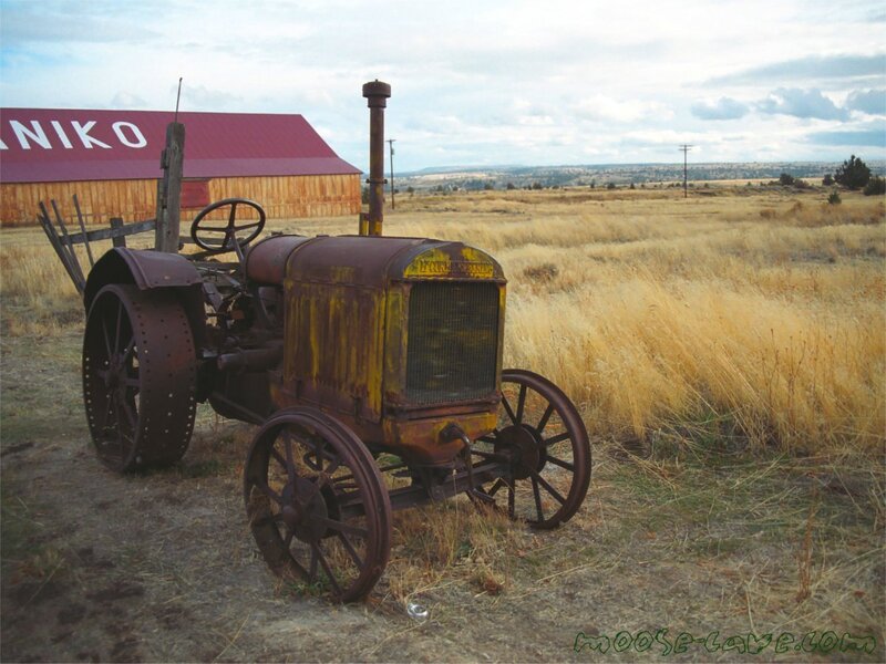 Rusty tractor in a field