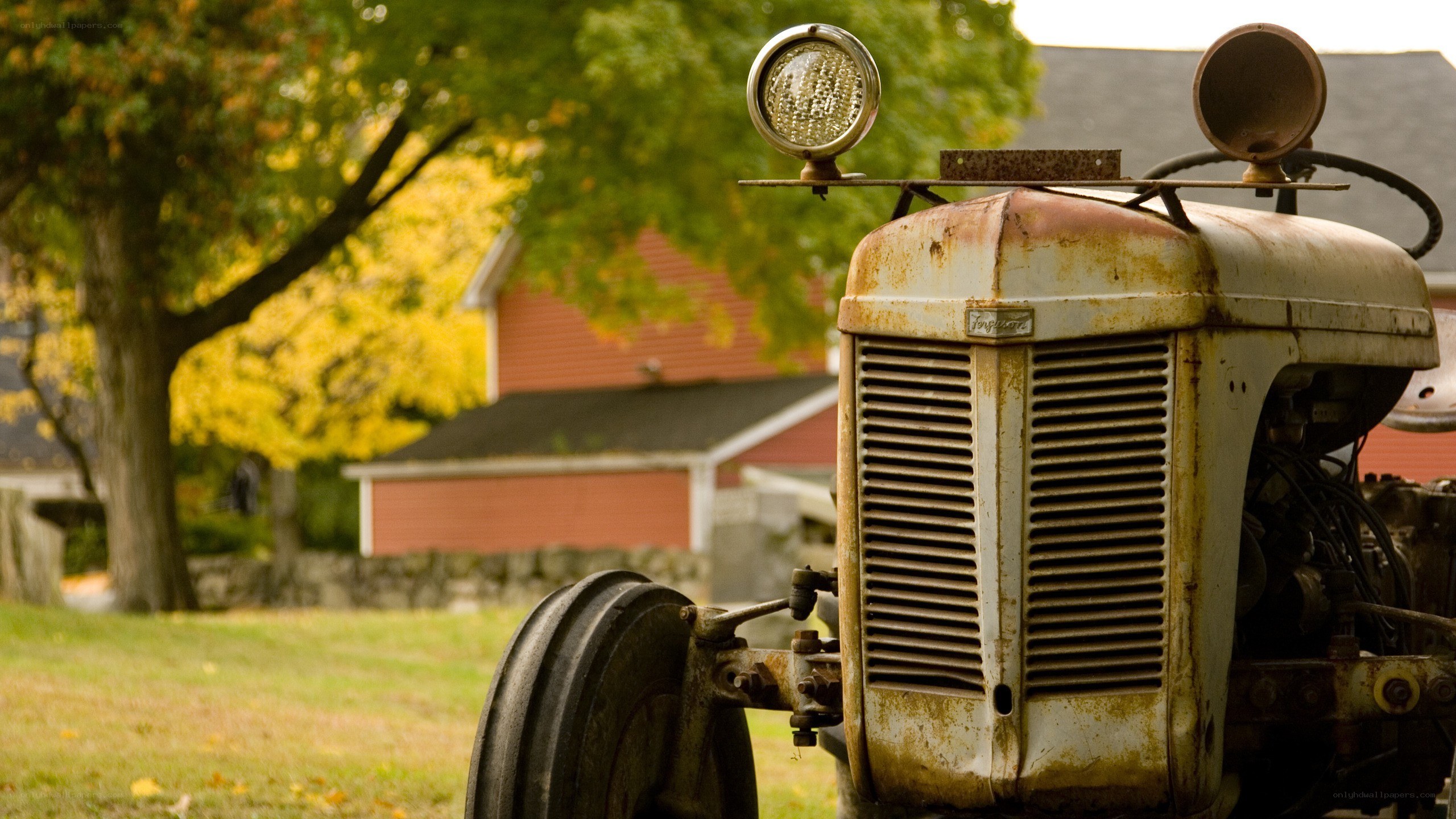 Rusty tractor in autumn