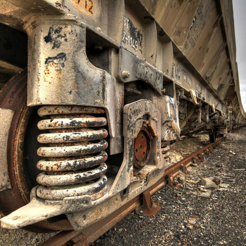 Rusty train car on tracks