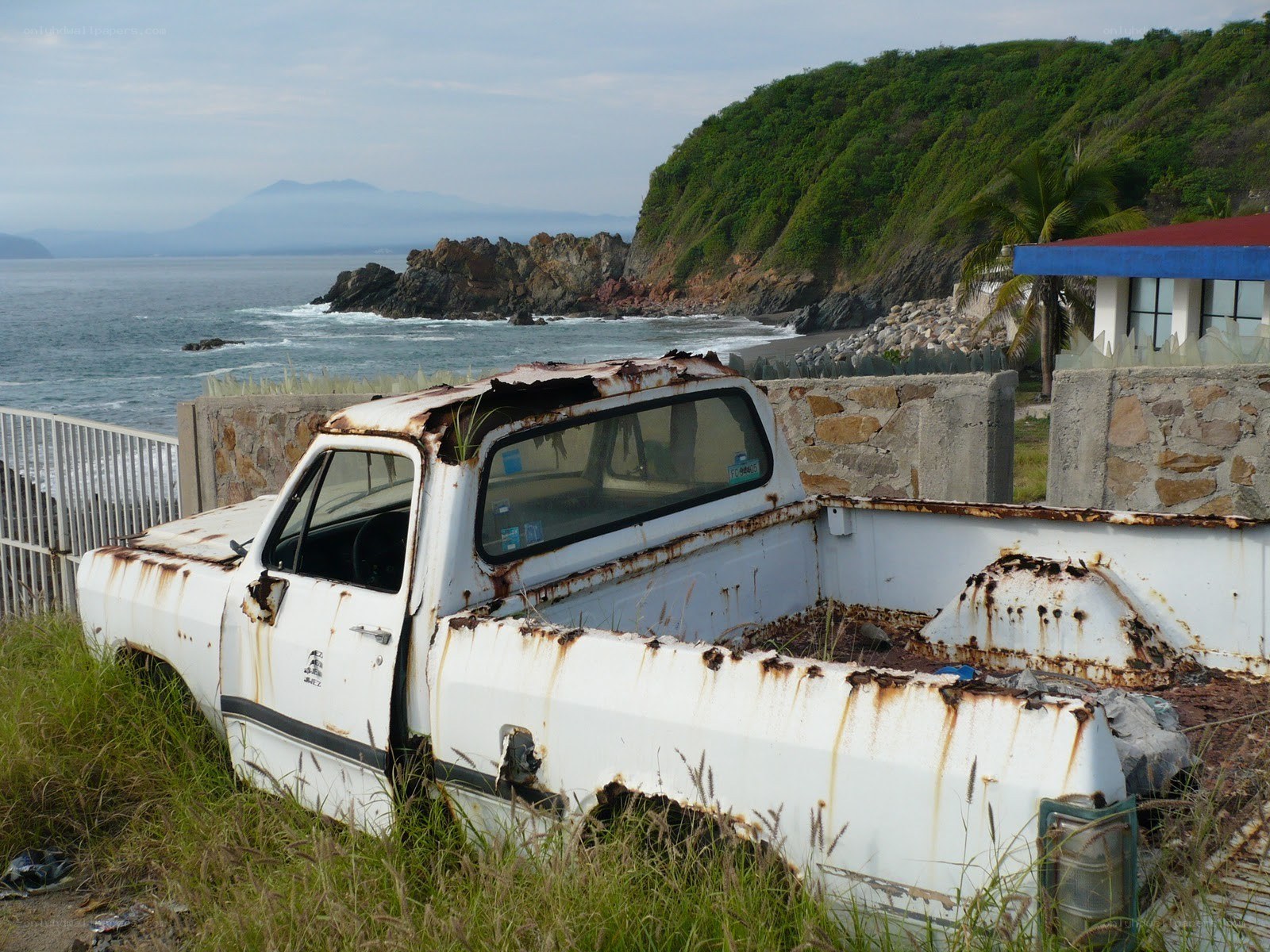 Rusty truck by the coast