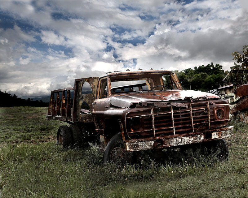 Rusty truck in a field