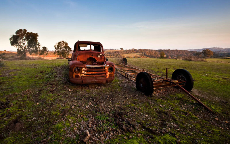 Rusty truck in a field