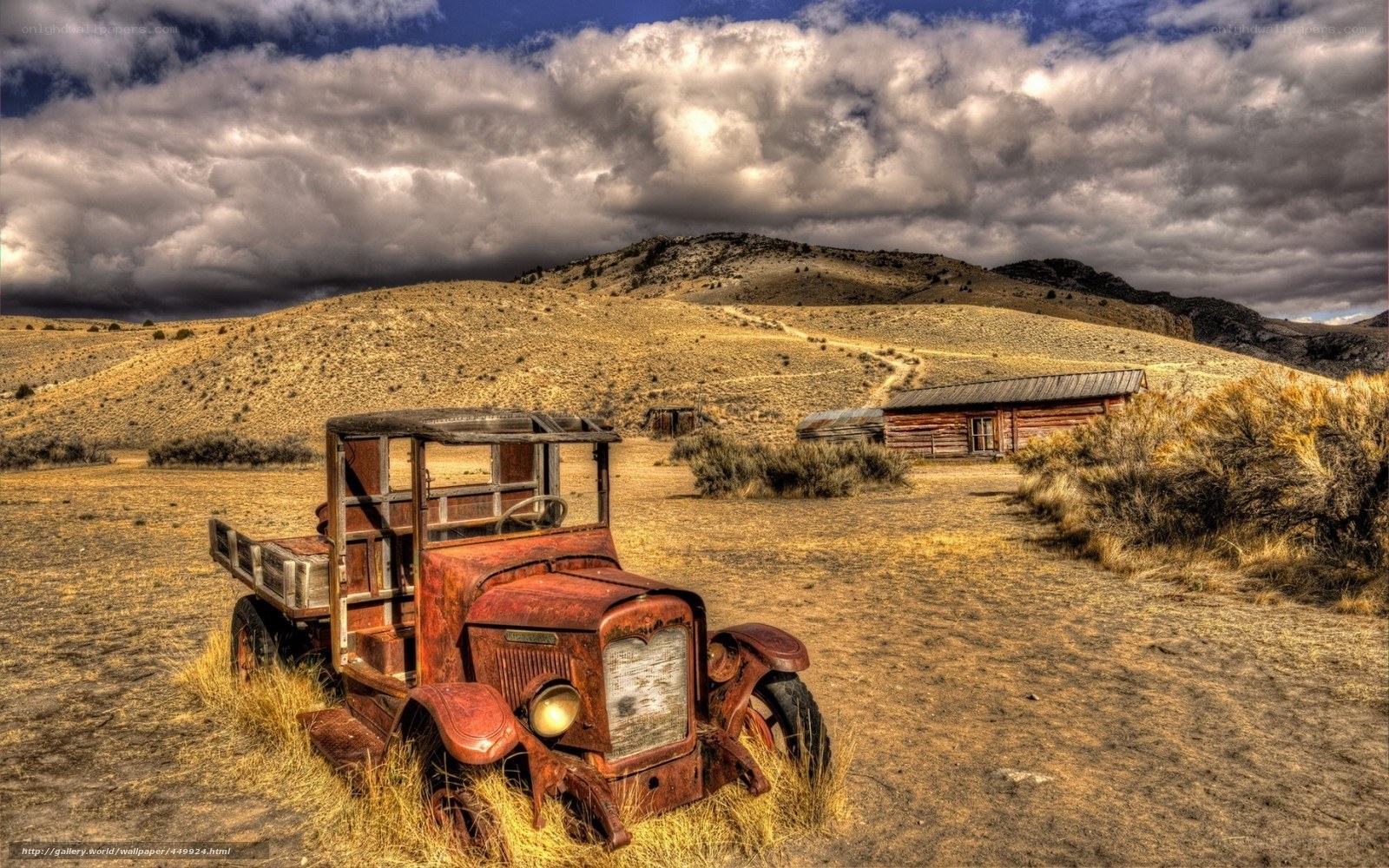 Rusty truck in desert landscape