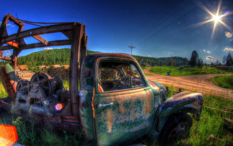 Rusty truck on a rural road