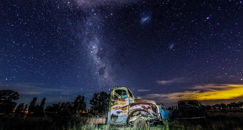 Rusty Trucks under Stars — Blue, Serene