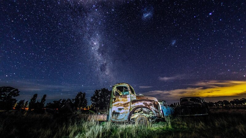 Rusty Trucks under Stars