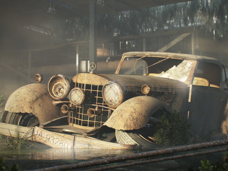 Rusty vintage car in abandoned garage