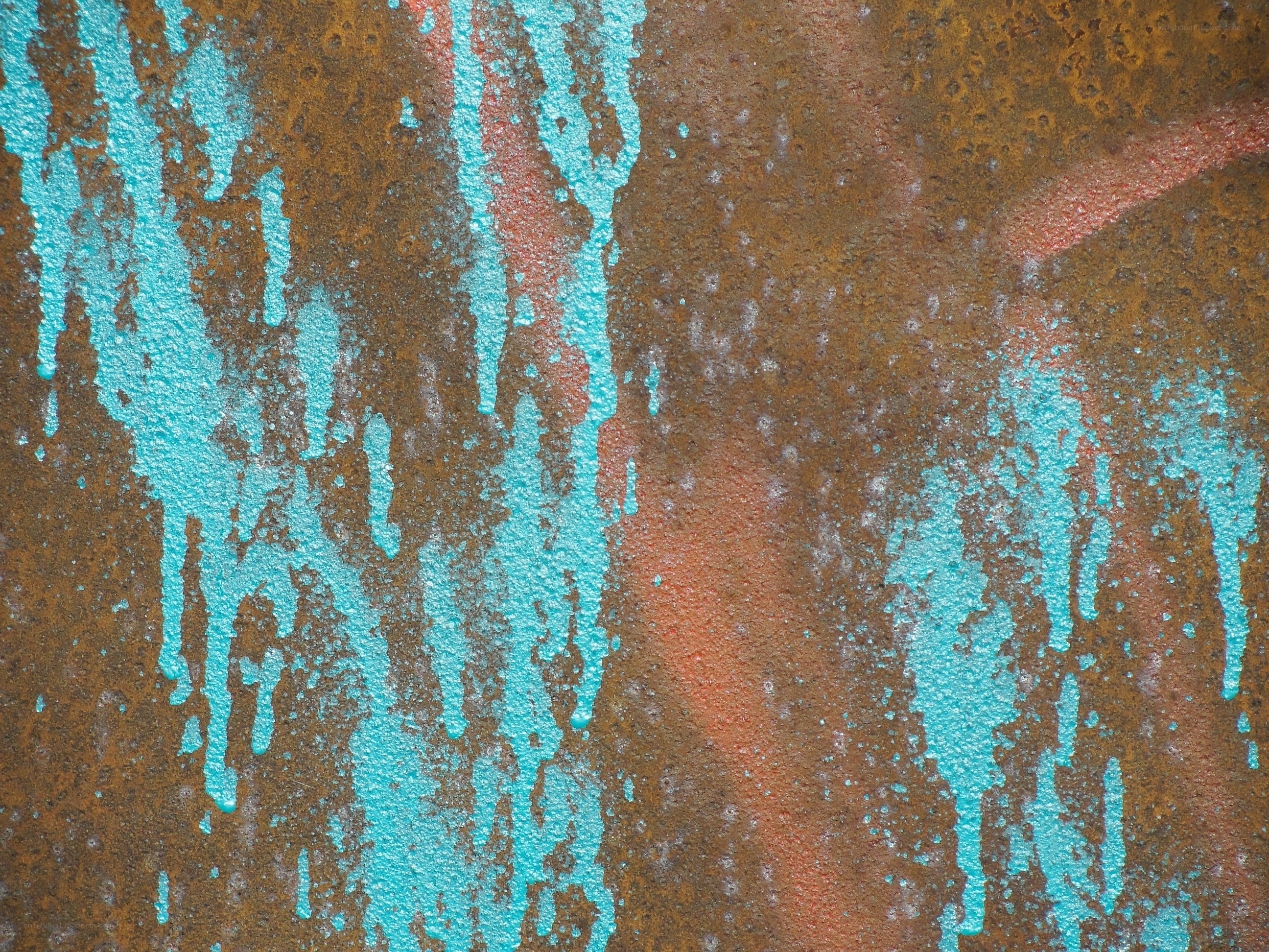 rusty wall with blue paint