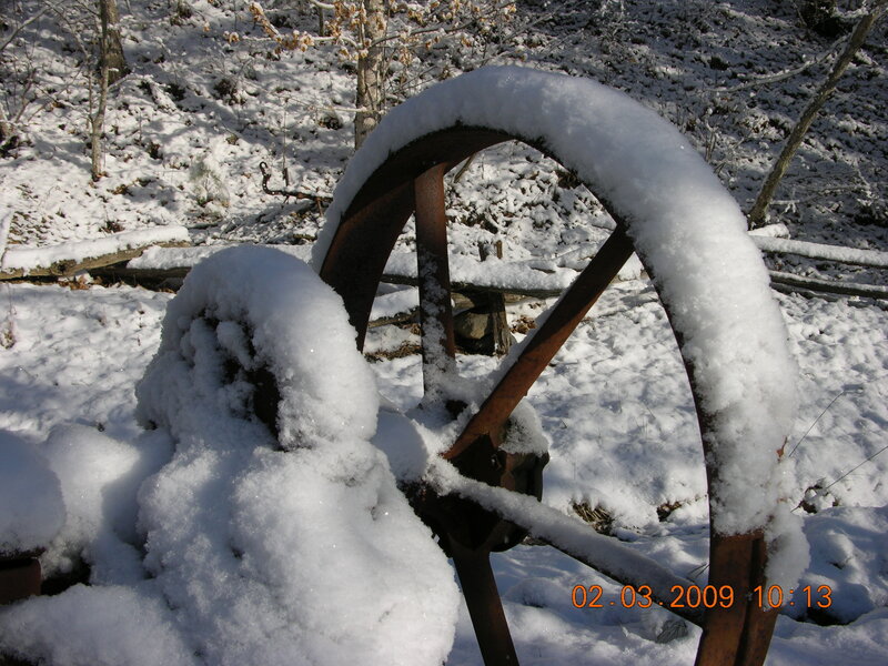 Rusty Wheel in Snow