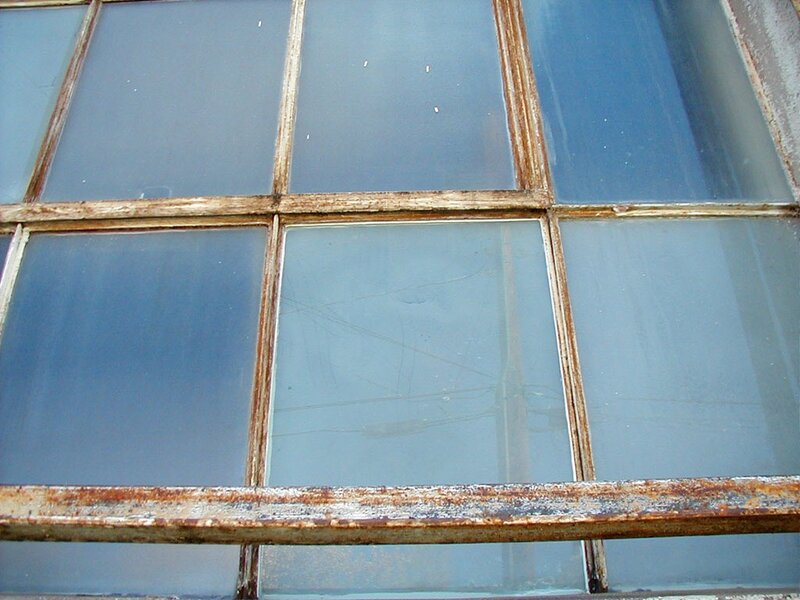 Rusty window with glass panes