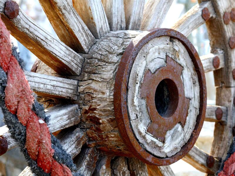 Rusty Wooden Wagon Wheel