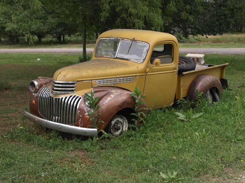 Rusty Yellow Pickup Truck