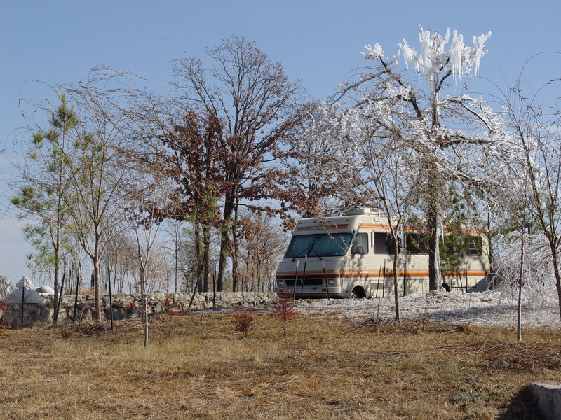RV parked in frosty landscape