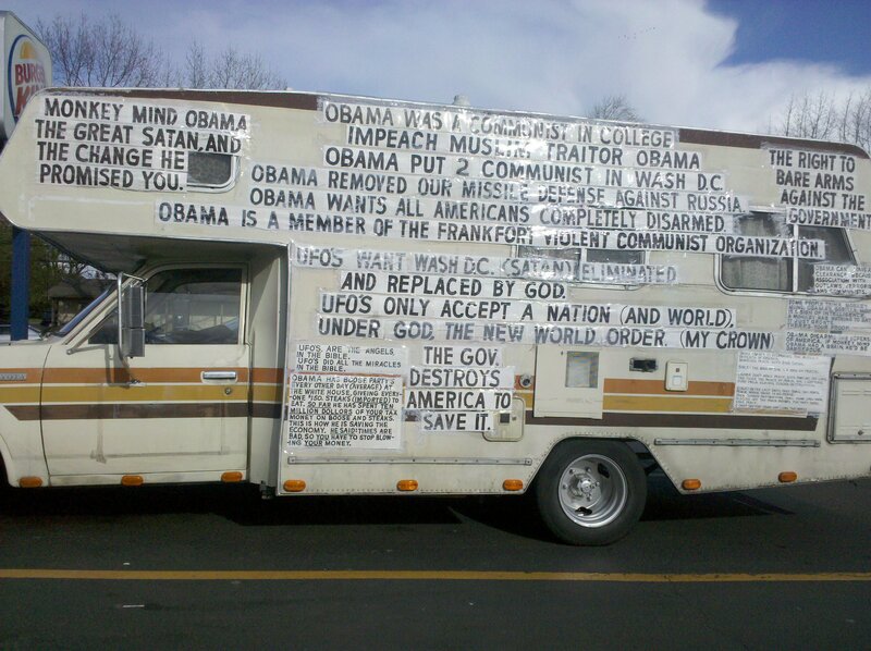 RV with political and religious signs