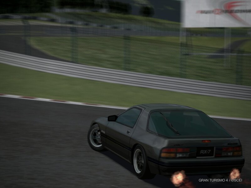 RX-7 racing on track