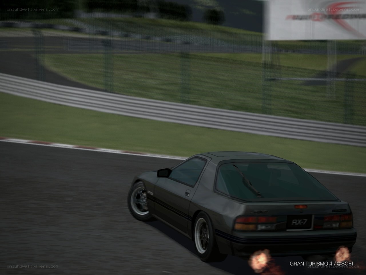 RX-7 racing on track