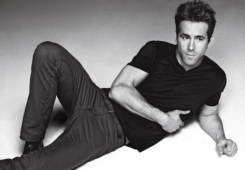 Ryan Reynolds posing on floor