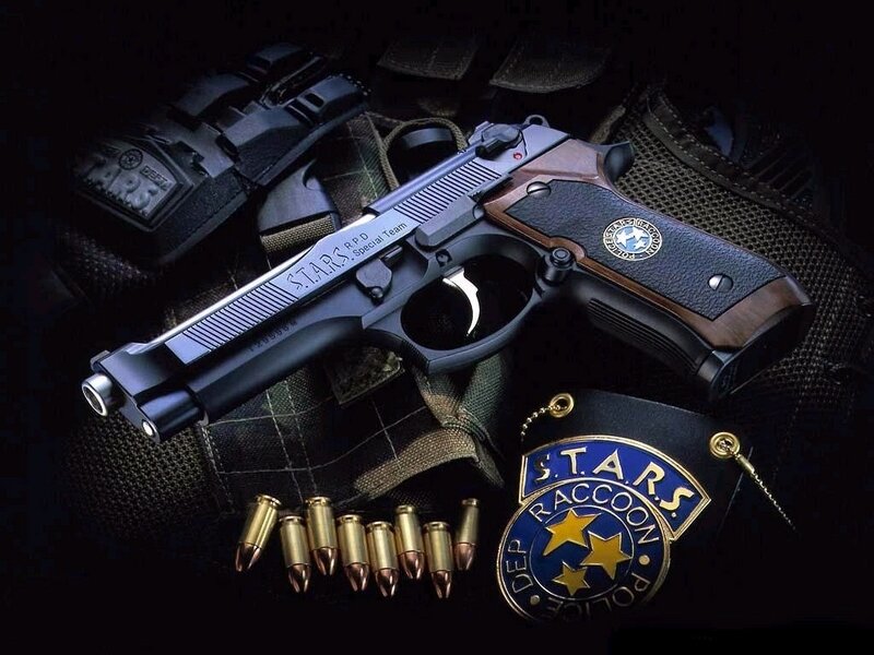 S.T.A.R.S. handgun and badge