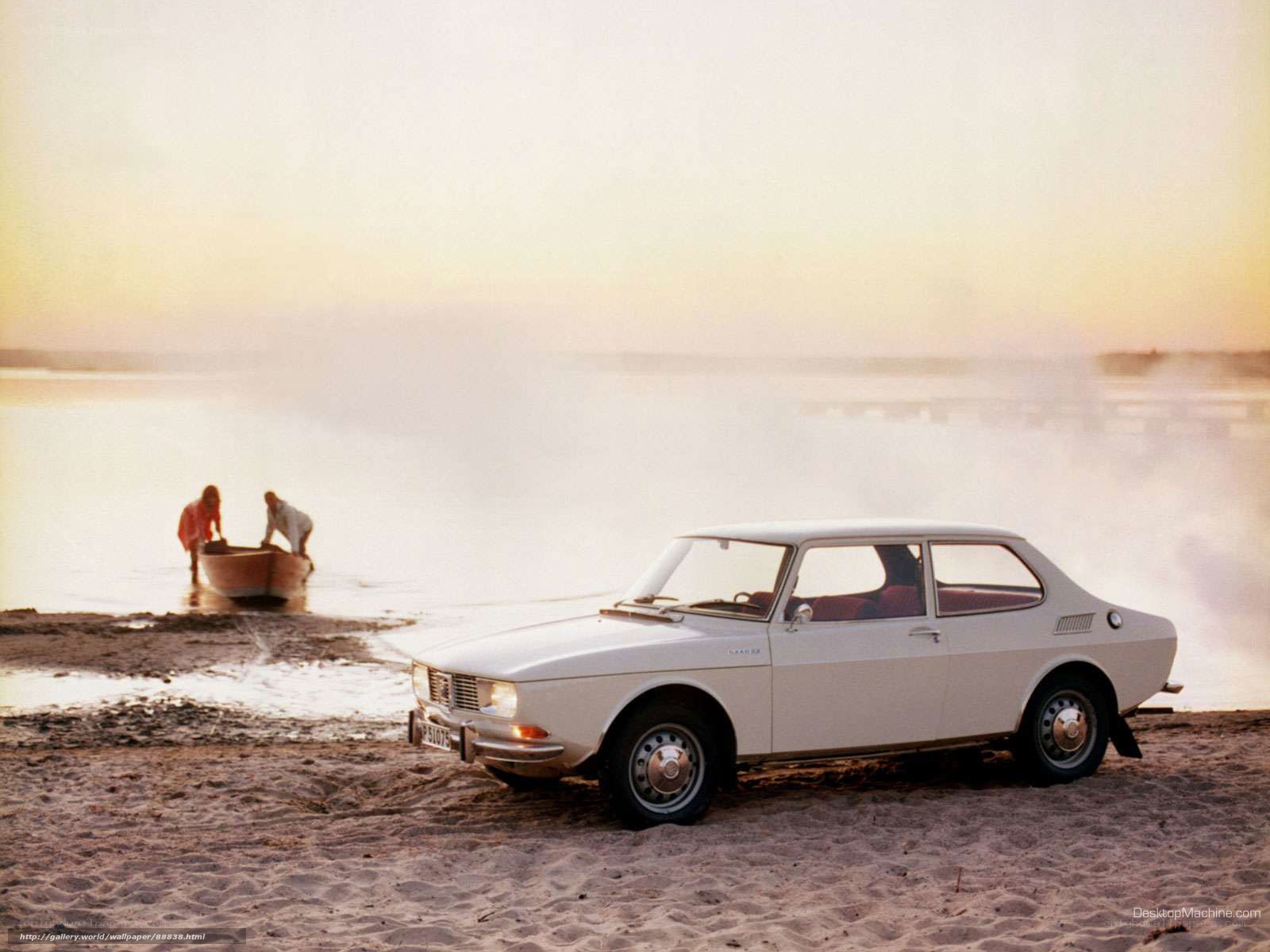 Saab 99 on a beach at sunset