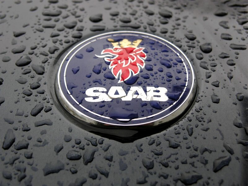 Saab car emblem with water droplets