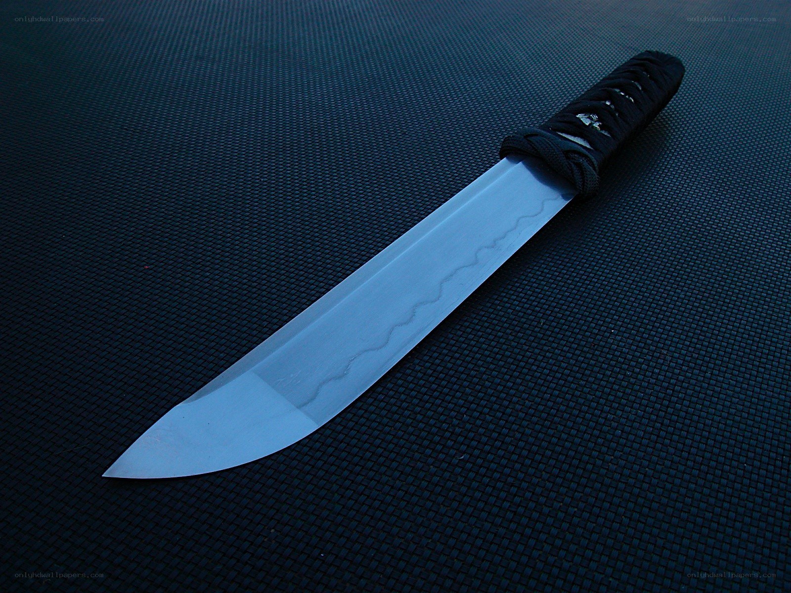 saber knife on textured surface