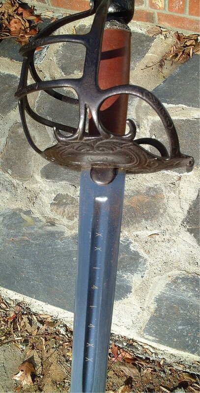 saber with ornate guard