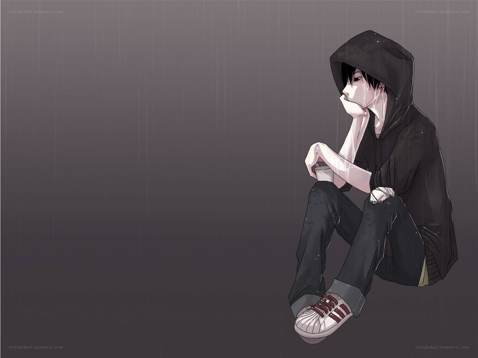 sad boy in the rain