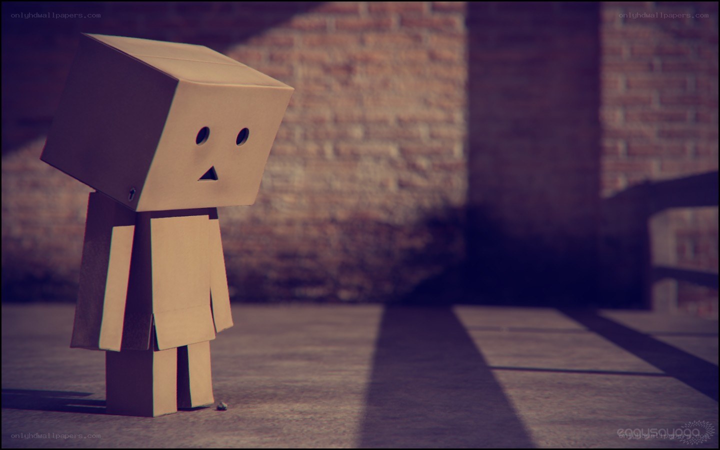 sad cardboard box figure