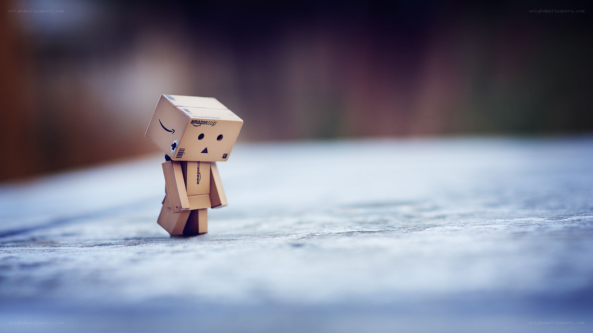 Sad cardboard robot figure