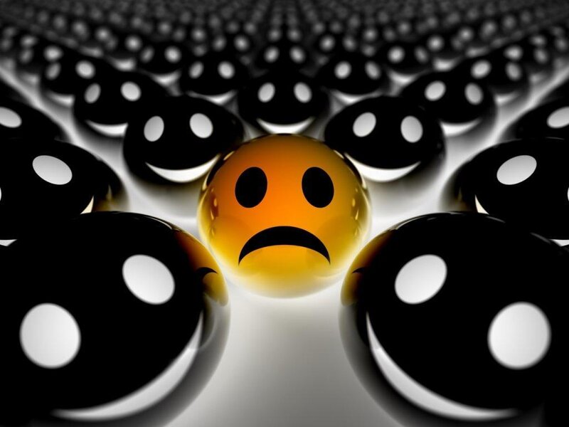 Sad Emoji Among Happy Ones — Yellow