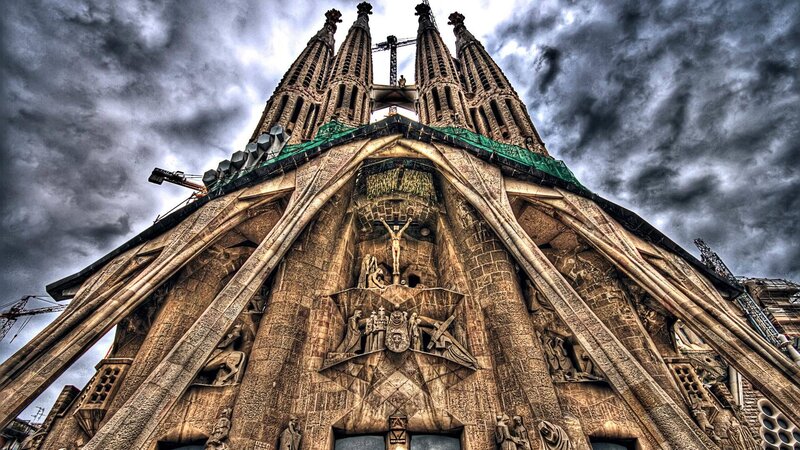 Sagrada Familia under stormy sky