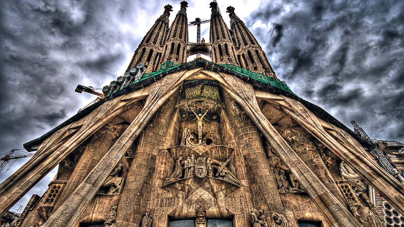 Sagrada Familia under stormy sky